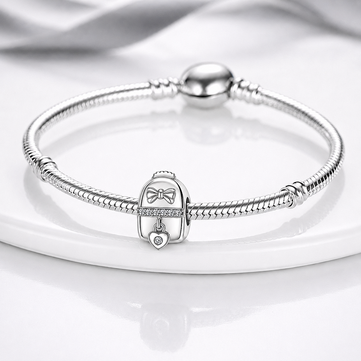 MariaFonte Charm Zaino con Fiocco e Cuore Pendente in Argento 925 con Zirconi Compatibile con Collane e Bracciali